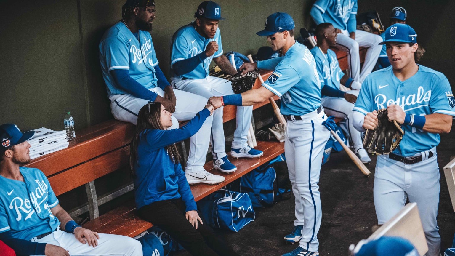 Melissa Lambert takes her place within the Royals' dugout. (Photo via Jason Hanna, Kansas City Royals)